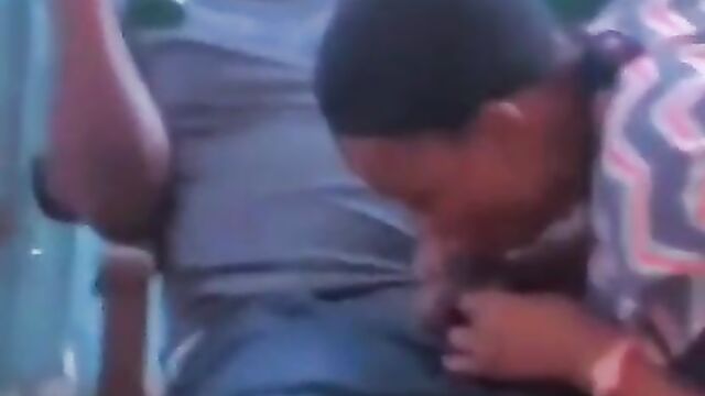 African girl giving sugar daddy blow job in public in a restaurant - 3 image