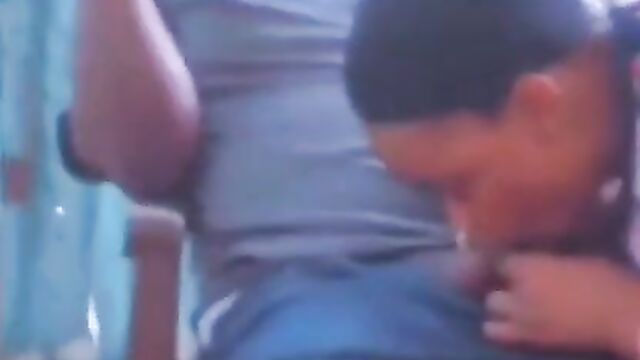 African girl giving sugar daddy blow job in public in a restaurant - 4 image