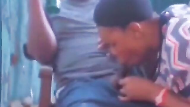 African girl giving sugar daddy blow job in public in a restaurant - 5 image