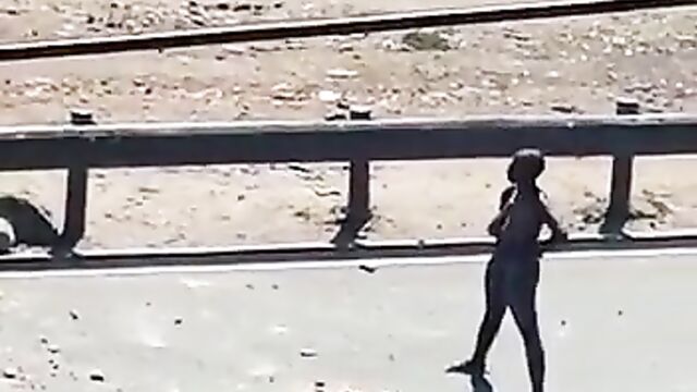 Naked woman confronts riot police in South Africa