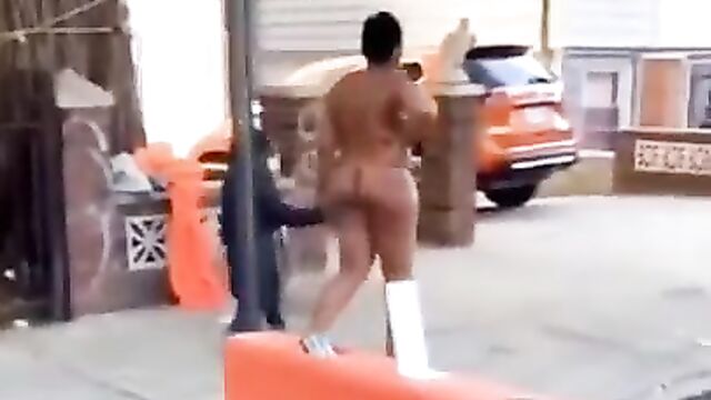 Naked woman walking her daughter to school in public, in The Bronx, NY, USA - 1 image