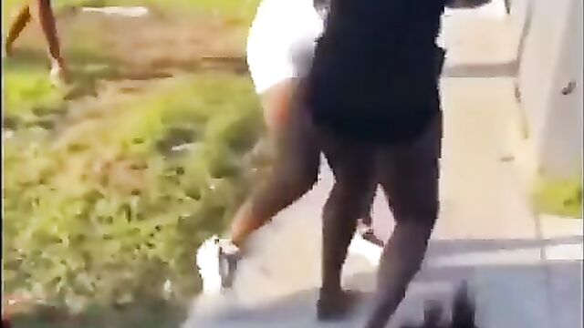 2 women caught fighting, exposing ass in public - 1 image