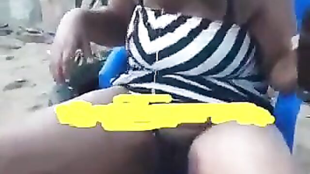Drunk Ashawo Exposing Her Toto In Public & Peeing In Public While Drinking Alcohol At A Restaurant - 5 image