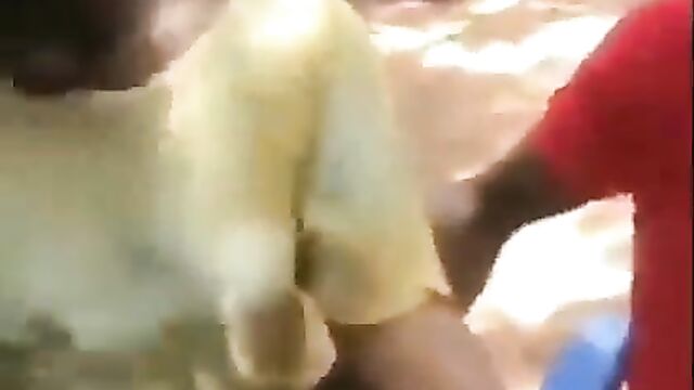 2 guys playing with Ashawo’s breasts and nipples in public - 4 image