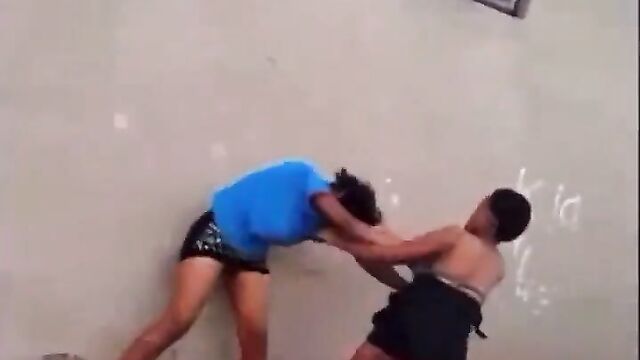 Breasts pop out as 2 street girls fight over a boyfriend in public - 1 image