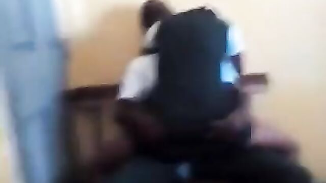 Students bonking on a bench in the classroom - 3 image