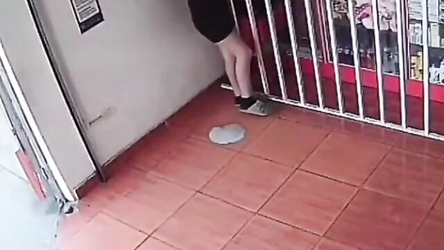 Crazy man masturbating and pouring cum on a lady in public in broad daylight - 3 image