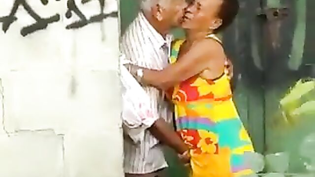 Crazy old man fingering old woman in public - 1 image
