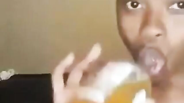 Girl records herself drinking as her friend receives head at a house party