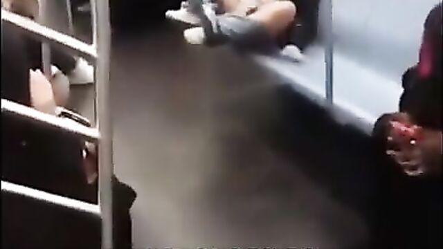 Woman touching herself on a train in New York City - 3 image