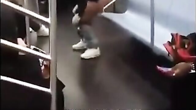 Woman touching herself on a train in New York City - 4 image