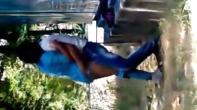 Student couple caught doing it outdoors in public - 1 image