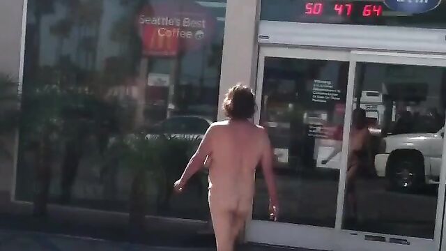 Naked woman caught in public at a gas station - 1 image