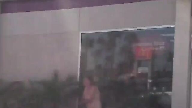 Naked woman caught in public at a gas station - 5 image