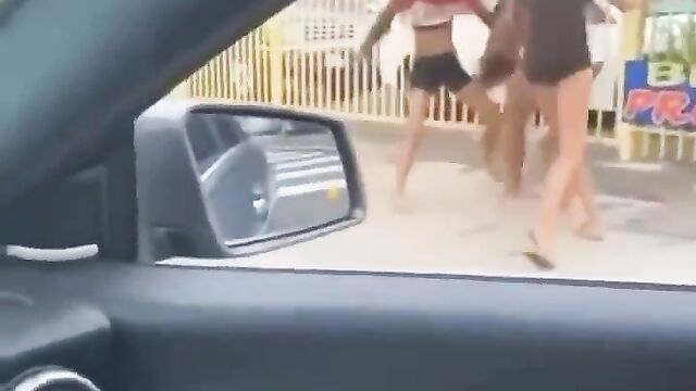 Boobs out as girlfriend gets caught and beaten for allegedly snatching her friend’s boyfriend - 1 image
