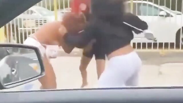 Boobs out as girlfriend gets caught and beaten for allegedly snatching her friend’s boyfriend