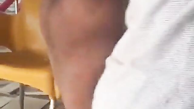 African woman strips, showing her big nyash in a public restaurant - 4 image