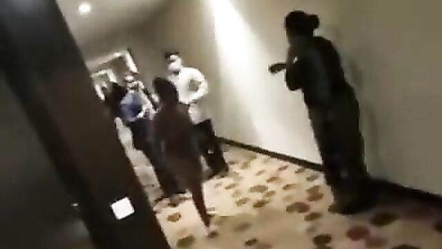 Naked woman with big breasts caught fighting hotel staff - 5 image