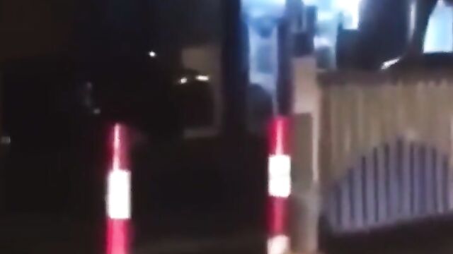 Naked woman masturbating on the road, obstructing traffic