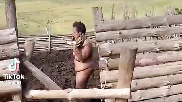 Naked Woman Caught On A Farm, Showing Her Breasts In Public - 1 image