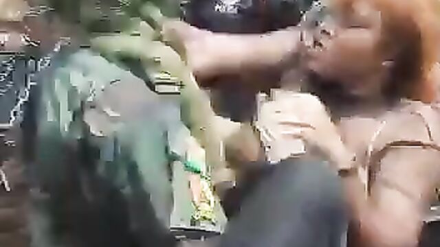 Breasts pop out as soldiers strip lady in public while dancing - 5 image