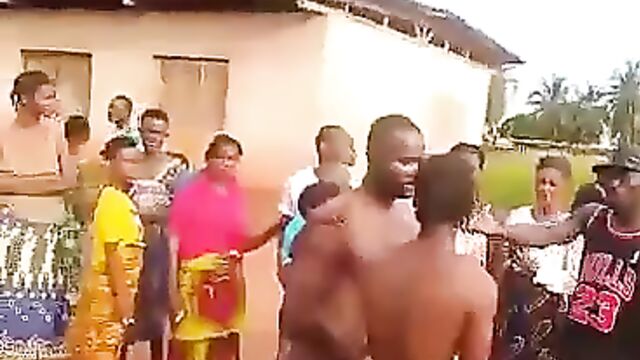 African Couple stripped naked in public - 3 image