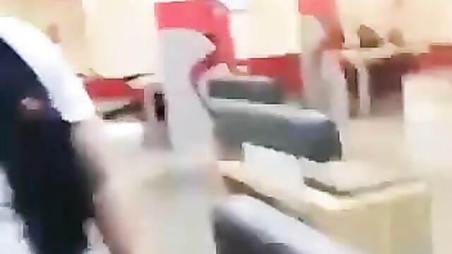 Woman strips naked in a bank - 4 image