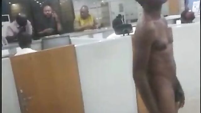 Man strips naked in public in a bank in Nigeria while asking for his money