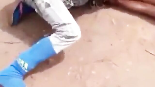 Ass pops out as crazy fashion police beat African woman in public for allegedly not wearing panties and wearing a ‘short’ dress to the market - 2 image