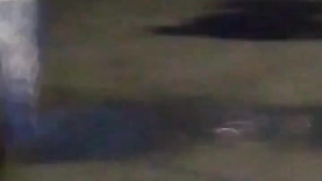 Nigerian lady showing her breasts after stripping and running mad in public - 1 image