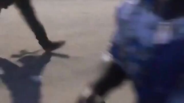 Nigerian lady showing her breasts after stripping and running mad in public - 3 image