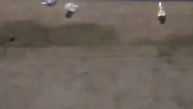 Nigerian lady showing her breasts after stripping and running mad in public - 4 image