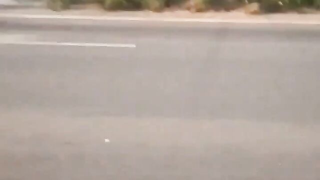 Nigerian lady showing her breasts after stripping and running mad in public - 5 image