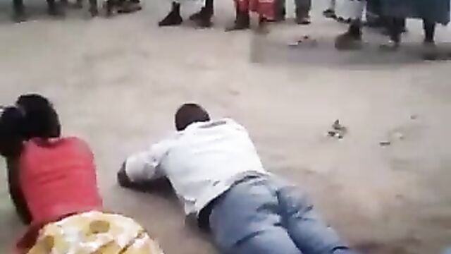 Caught cheating and beaten in public - 1 image