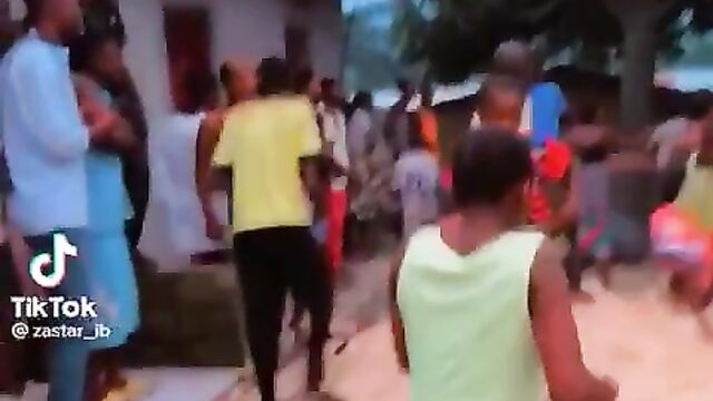 Breasts pop out as lady runs mad in public - 1 image