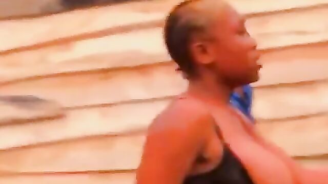 Breasts pop out as lady runs mad in public - 3 image