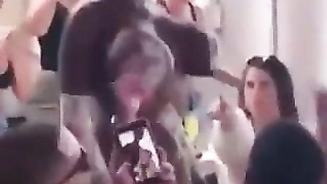 Stripper exposing her big breasts in public at a party for money - 1 image