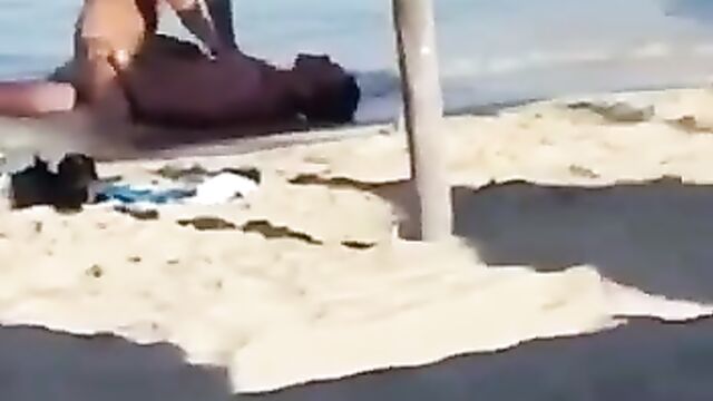 Couple having sex on the beach - 3 image