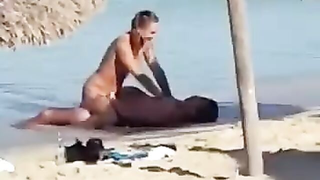 Couple having sex on the beach - 5 image