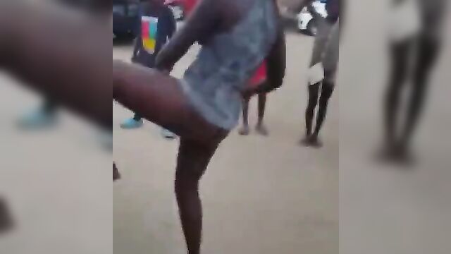 Shameless whore caught showing her pussy and ass on the streets