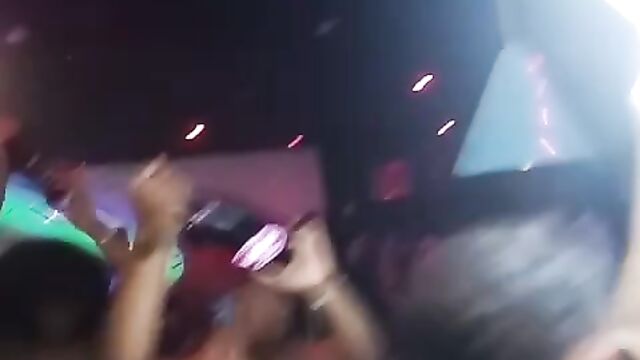 Boobs for show in an African club party - 1 image