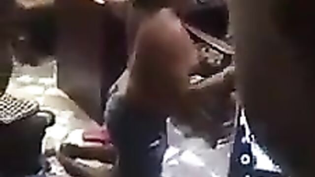 Lady stripped naked in public for allegedly shoplifting - 1 image