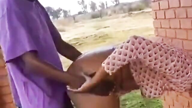 Mzansi man banging a thot doggy style in front of his friends on a public field - 5 image