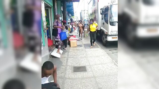 African street whore with Big Tits walking naked in public - 1 image