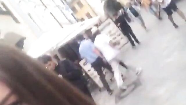 Crazy woman naked in public, showing breasts - 1 image