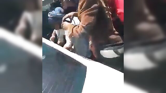 Ebomy Woman Stripped Naked And Beaten In Public After Being Dragged Out Of A Car