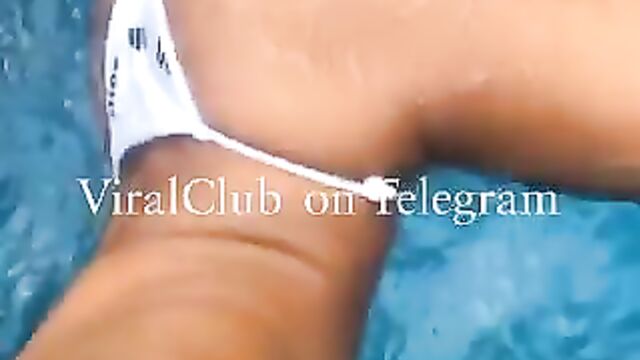 Girl showing breasts and wildin in the pool - 4 image