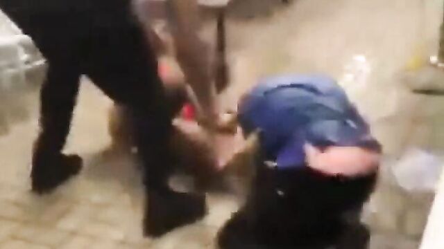 Breast pops out as women fight in a restaurant - 1 image