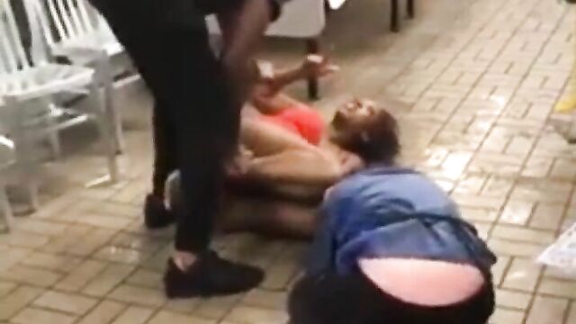 Breast pops out as women fight in a restaurant - 3 image