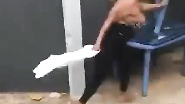 Alleged mad woman strips naked, showing breasts in public while dancing